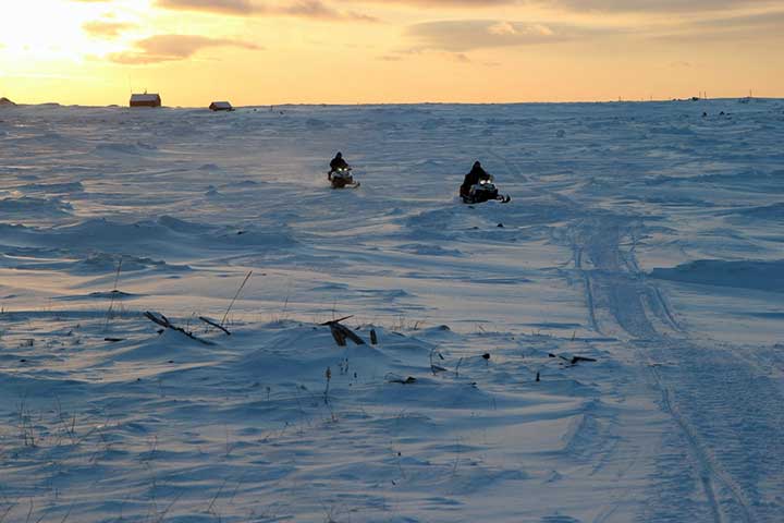 kola travel snowmobile expedition southernmost point kola peninsula varzuga strelna chavanga krasnoschelye lighthouse nikodimsky