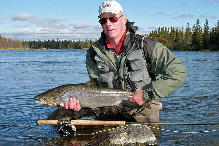 Atlantic Salmon fishing holiday in Umba River and Krivetz based on full board accommodation, personal guide service with boat, duration as you wish. Hook the biggest or catch a lot!